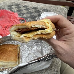 Bacon, egg, tropical-cheese, and ham pressed sandwich. Countless variations available.