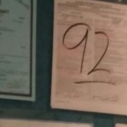 a number of papers on a wall