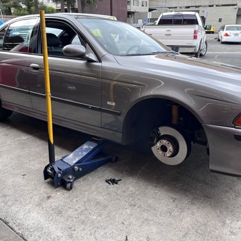 Wheel Works - Car getting tire repaired - Tires Near Me - San Mateo, California Wheel Works - Car getting tire repaired - Tires Near Me - San Mateo, California
