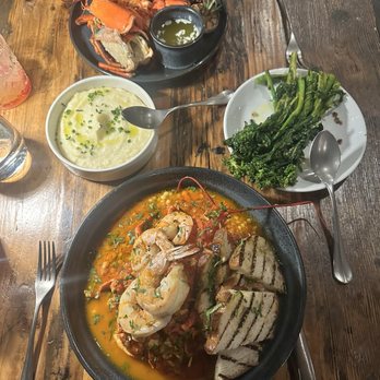 Felina Steak - Broccolini, Steak, Lobster with Couscous, Mashed Potatoes. - Italian Near Me - Jersey City, New Jersey Felina Steak - Broccolini, Steak, Lobster with Couscous, Mashed Potatoes. - Italian Near Me - Jersey City, New Jersey