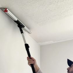 RG7 Repair - Transforming textured surfaces into smooth, modern Level 5 finishes.