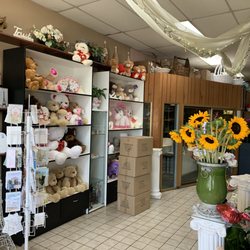 Lynette's Flowers & Gifts - Refrigerator in the back