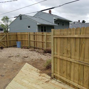 Woodward Construction - a backyard with a wooden fence - General Contractors Near Me Woodward Construction - a backyard with a wooden fence - General Contractors Near Me