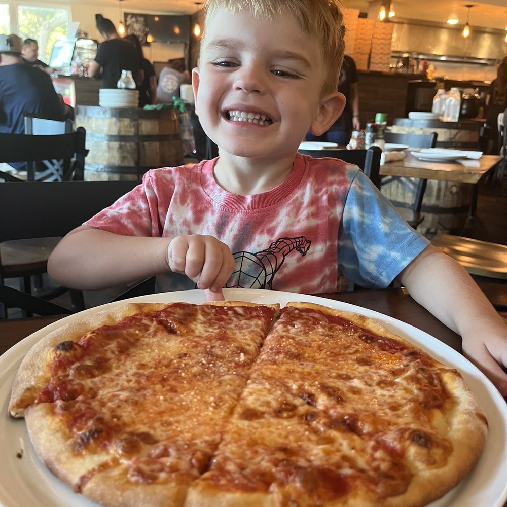 Caffe Vesuvio's Pizzaria - Kids were quite happy with their pizza! - Italian Near Me - New Smyrna Beach, Florida Caffe Vesuvio's Pizzaria - Kids were quite happy with their pizza! - Italian Near Me - New Smyrna Beach, Florida