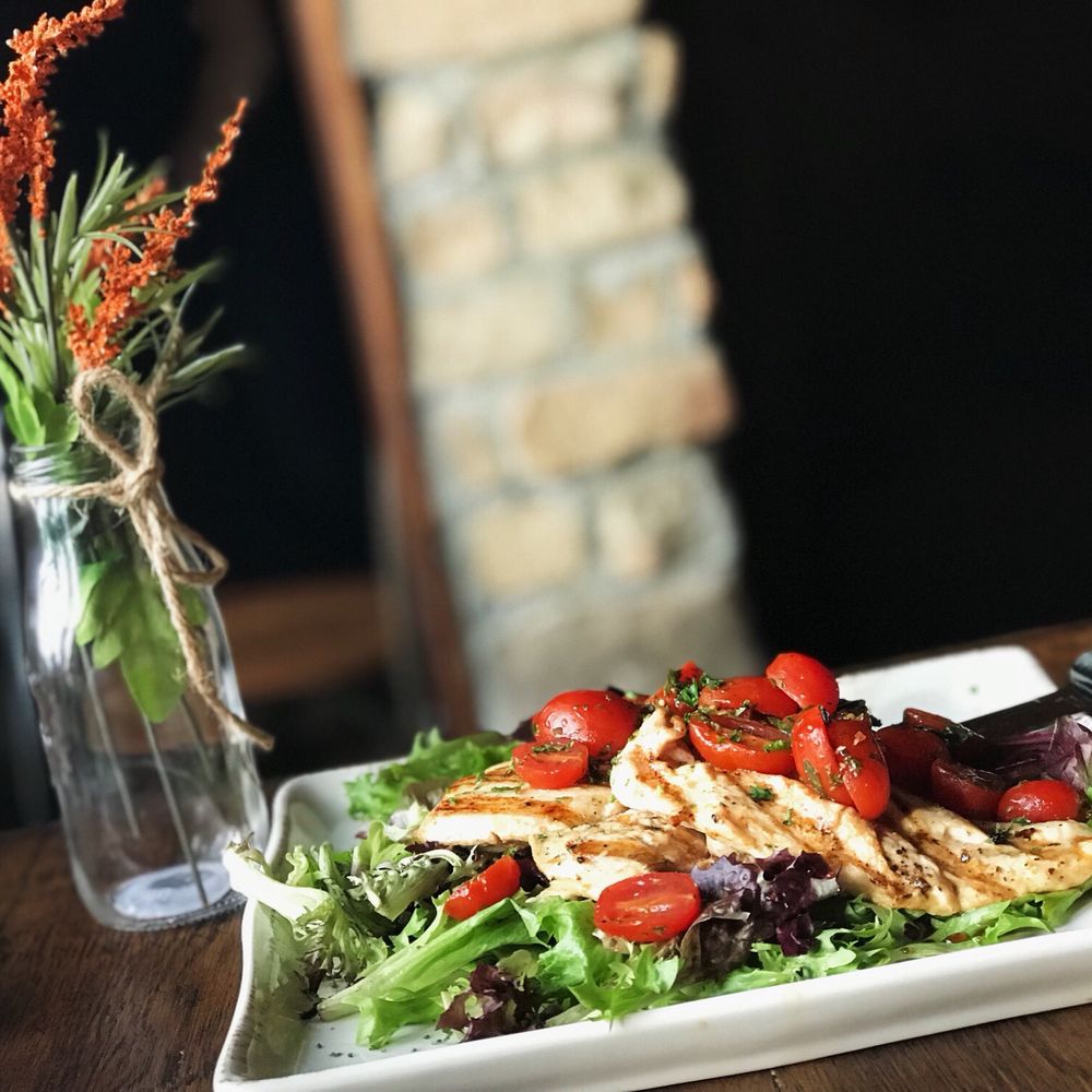 Maggies Town Tavern - Grilled Parmesan crusted chicken breast with bruschetta and mixed greens with balsamic reduction. - Bars Near Me - Wayne, New Jersey Maggies Town Tavern - Grilled Parmesan crusted chicken breast with bruschetta and mixed greens with balsamic reduction. - Bars Near Me - Wayne, New Jersey