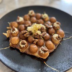 House of Brunch - Bubble Waffle--sweet potato waffle with candied walnuts, lemon rind, mint, goat cheese and honeycomb. WOW, tasty!