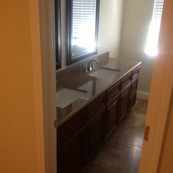 Avila's Construction - a bathroom with a sink and a window - General Contractors Near Me - San Jose, California