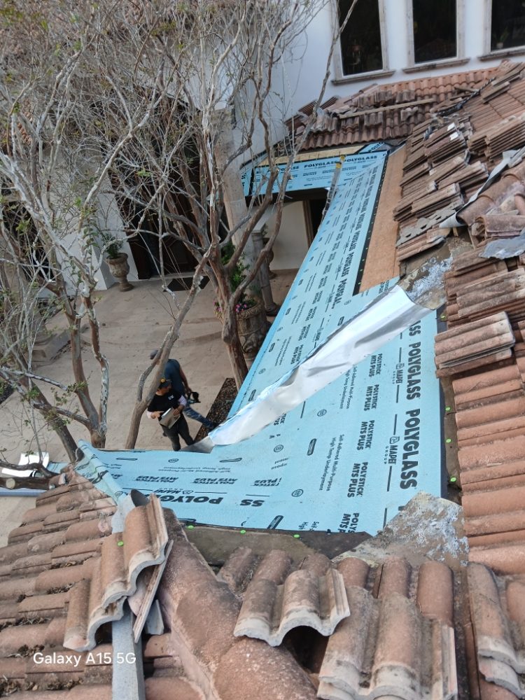 Slide of Mark Roofing Construction