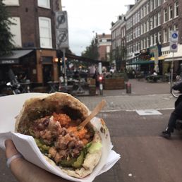 The street on which I ate this magnificent food. Tomatoes in there too. Everything so fresh and good. The street on which I ate this magnificent food. Tomatoes in there too. Everything so fresh and good.