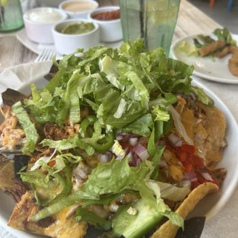 Rosie's Bar & Grill - Chicken nachos. Don't recommend with beard. Messy - Gay Bars Near Me - Wilton Manors, Florida Rosie's Bar & Grill - Chicken nachos. Don't recommend with beard. Messy - Gay Bars Near Me - Wilton Manors, Florida