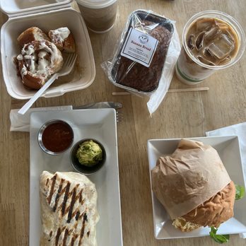 Hanalei Bread Company - cinnamon roll; banana bread; brekkie sandwich; breakfast burrito; iced vanilla latte; dark roast coffee - Breakfast & Brunch Near Me - Hanalei, Hawaii Hanalei Bread Company - cinnamon roll; banana bread; brekkie sandwich; breakfast burrito; iced vanilla latte; dark roast coffee - Breakfast & Brunch Near Me - Hanalei, Hawaii
