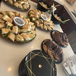 a variety of sandwiches and pastries a variety of sandwiches and pastries