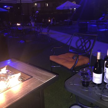 Humphreys Half Moon Inn - Night time with fire table top and some wine from the bar - San Diego, CA