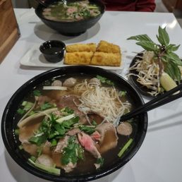 Beef Pho with Meatball, Rare Beef, And brisket as well as Pork Fried Spring roll appetizer. Beef Pho with Meatball, Rare Beef, And brisket as well as Pork Fried Spring roll appetizer.