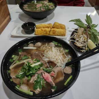 Phở Hà Nội - Beef Pho with Meatball, Rare Beef, And brisket as well as Pork Fried Spring roll appetizer. - Vietnamese Near Me - Mississauga, Ontario Phở Hà Nội - Beef Pho with Meatball, Rare Beef, And brisket as well as Pork Fried Spring roll appetizer. - Vietnamese Near Me - Mississauga, Ontario