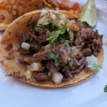 Los Carnalitos Restaurant - Front: Suadero (Beef) Taco-
Served on corn tortilla w/cilantro, onion and salsa. Back: Ricos Albondigas Taco - Mexican Near Me - Hayward, California Los Carnalitos Restaurant - Front: Suadero (Beef) Taco-
Served on corn tortilla w/cilantro, onion and salsa. Back: Ricos Albondigas Taco - Mexican Near Me - Hayward, California