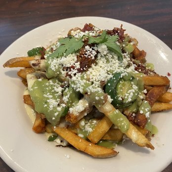 Cruzteca Mexican Kitchen - Queso fries aka Mexican disco fries - Breakfast & Brunch Near Me - Austin, Texas Cruzteca Mexican Kitchen - Queso fries aka Mexican disco fries - Breakfast & Brunch Near Me - Austin, Texas