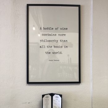 Barterra Winery - A sign with the quote "A bottle of wine contains more philosophy than all the books in the world." by Louis Pasteur - Wine Tasting Room Near Me - Half Moon Bay, California Barterra Winery - A sign with the quote "A bottle of wine contains more philosophy than all the books in the world." by Louis Pasteur - Wine Tasting Room Near Me - Half Moon Bay, California