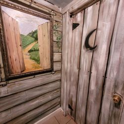 Front Porch Restaurant & Pie Shop - Cute outhouse painted bathroom