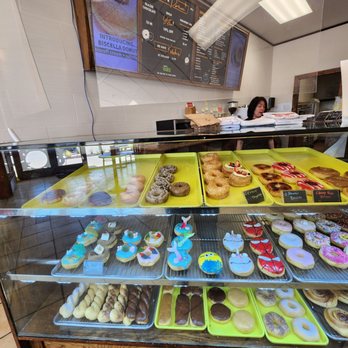 Sugarboy Donuts - a display of various flavored donuts - Coffee & Tea Near Me - Frisco, Texas Sugarboy Donuts - a display of various flavored donuts - Coffee & Tea Near Me - Frisco, Texas