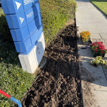 Huerta's Landscape & Maintenance - a blue mailbox on a sidewalk - Gardeners Near Me - San Gabriel, California Huerta's Landscape & Maintenance - a blue mailbox on a sidewalk - Gardeners Near Me - San Gabriel, California