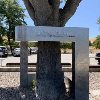 James Dean Crash Site & Memorial - 08.11.19 sculpture made of concrete and stainless steel surrounding a tree outside the Jack Ranch Cafe - Local Flavor Near Me - Cholame, California James Dean Crash Site & Memorial - 08.11.19 sculpture made of concrete and stainless steel surrounding a tree outside the Jack Ranch Cafe - Local Flavor Near Me - Cholame, California
