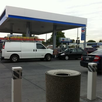 Chevron - a gas station with cars parked in the lot - Gas Stations Near Me - Tarzana, California