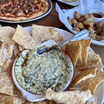 Yard House - Four Cheese Spinach Dip The Carnivore Pizza Wisconsin Fried Cheese Curds Poke Nachos - New American Near Me - Costa Mesa, California