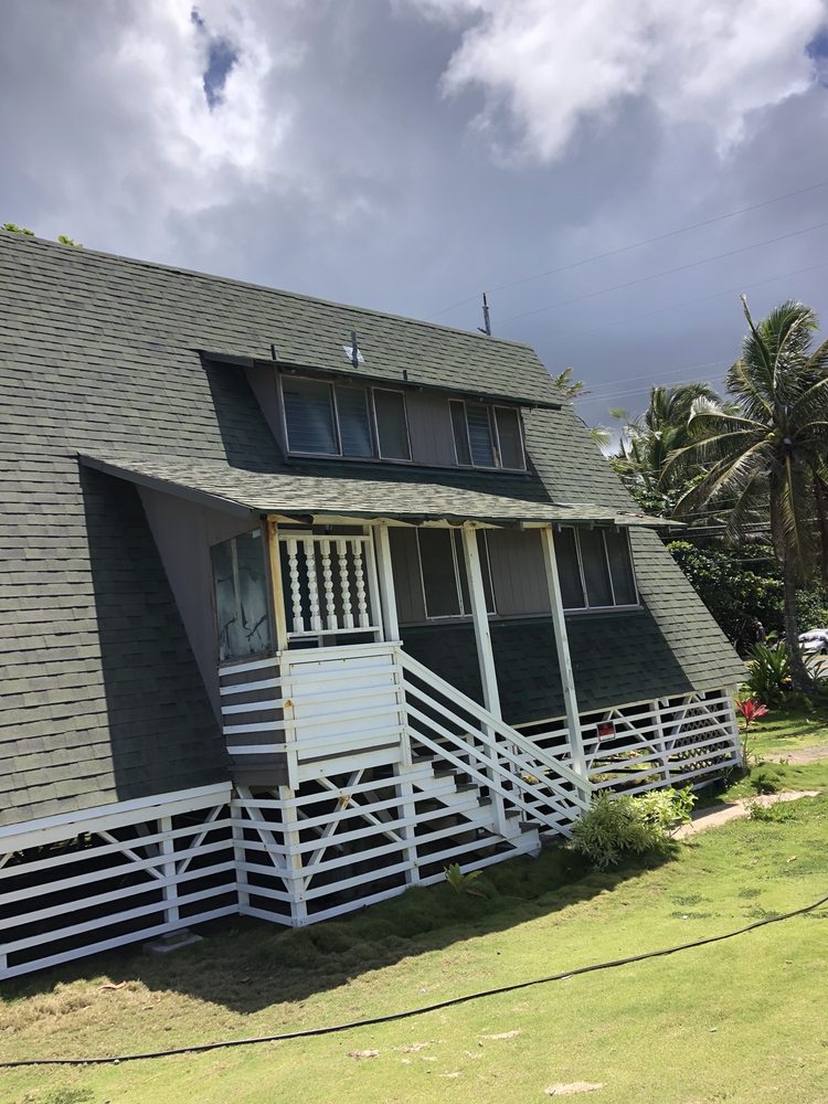 Slide of New Era Roofing