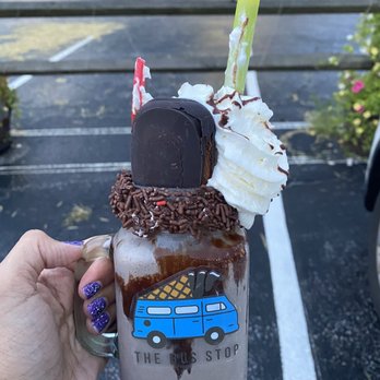 The Bus Stop - Meet Me at Midnight Extreme: peanut butter marshmallow ice cream, chocolate icing and sprinkles and topped with a fudge bar and crunch bar. - Ice Cream & Frozen Yogurt Near Me - Upperco, Maryland