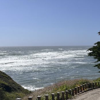 Moss Beach Distillery - Side view of the walkway to the ocean - Seafood Near Me - Moss Beach, California Moss Beach Distillery - Side view of the walkway to the ocean - Seafood Near Me - Moss Beach, California