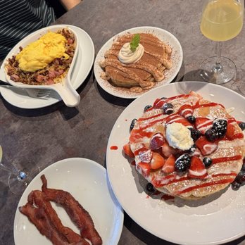 That’s my jam - Meat lovers skillet, tiramisu pancakes, very berry pancakes, side of bacon - New American Near Me - The Hills, Texas