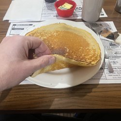 Sporty's Bar & Grill - 3/8" thick, fluffy! Great texture. My favorite pancake in Grand Haven