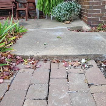 Thrasher Foundation Repair - There should not be a raised area at this area. Now we have a 3" step up, where there shouldn't be any. - Waterproofing Near Me - Lenexa, Kansas