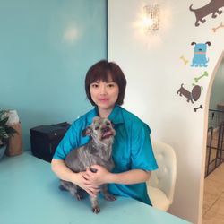 Dawg Gone Good Grooming - Ran K. Owner and founder with her dog Alex