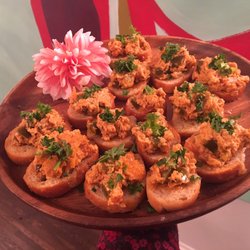 Root To Rise Kitchen - Muffuletta Cashew Dip on crostinis