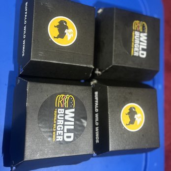 Wild Burger - four boxes on a blue tray - Burgers Near Me - Cape Coral, Florida Wild Burger - four boxes on a blue tray - Burgers Near Me - Cape Coral, Florida
