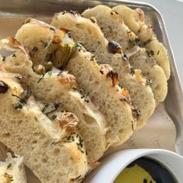 The Onion special focaccia was served warm with balsamic and olive oil for dipping.