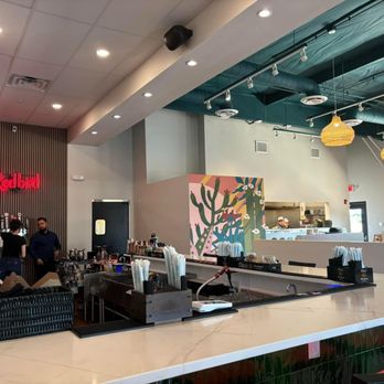 Redbird Scratch Kitchen + Bar - Bar on left dining on right - Chicken Wings Near Me - Tucson, Arizona Redbird Scratch Kitchen + Bar - Bar on left dining on right - Chicken Wings Near Me - Tucson, Arizona