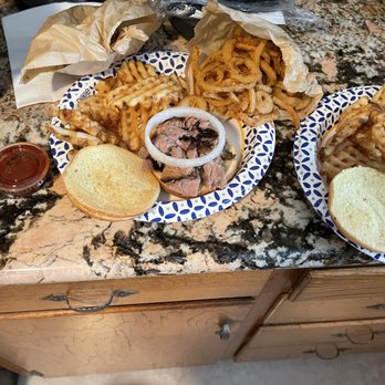 Dickey's Barbecue Pit - two plates of food on a counter - Barbeque Near Me - Whittier, California Dickey's Barbecue Pit - two plates of food on a counter - Barbeque Near Me - Whittier, California