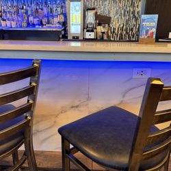 Blu Seafood - Hooks at the bar to hang your bag and outlets to charge your devices.