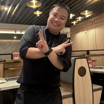Haidilao HotPot Chicago - Our fantastic server Evan! - Chinese Near Me - Chicago, Illinois