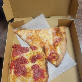 Gigis Pizza - Grandma slice and regular slice. - Pizza Near Me - New Hyde Park, New York Gigis Pizza - Grandma slice and regular slice. - Pizza Near Me - New Hyde Park, New York