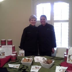 Encore Catering - Event Specialist Elise Barksdale and Catering Lead Carmen Morales at an event.