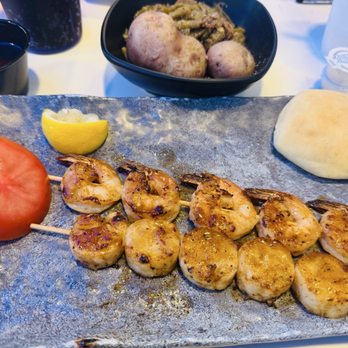 Bahama Bobs - Shrimp and scallops with green beans and potatoes. My sons tomato off his po'boy - Seafood Near Me - Gulf Shores, Alabama Bahama Bobs - Shrimp and scallops with green beans and potatoes. My sons tomato off his po'boy - Seafood Near Me - Gulf Shores, Alabama