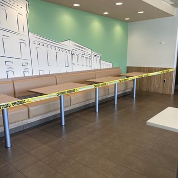 McDonald's - a line of benches with caution tape - Fast Food Near Me - New Boston, Texas McDonald's - a line of benches with caution tape - Fast Food Near Me - New Boston, Texas