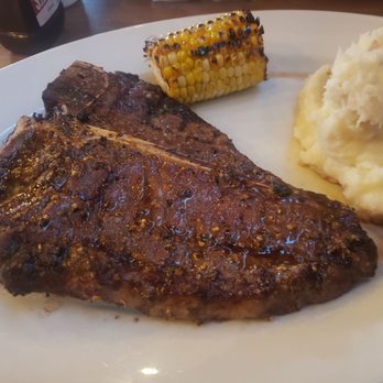 Chuck's Roadhouse Bar And Grill - 14oz T-bone steak with mashed potatoes and roasted corn - Bars Near Me - Aurora, Ontario