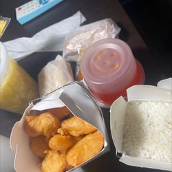 China City - Sweet-and-sour chicken with the chicken busting out of the lid a little LOL. Also got egg drop soup and a spring roll