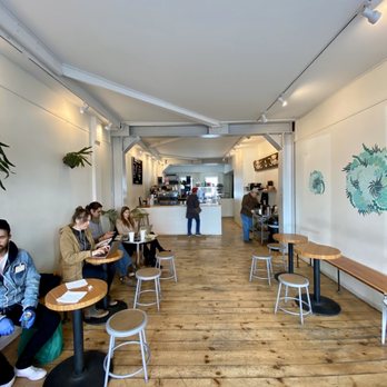 Supernatural Coffee - people sitting at tables in a coffee shop - Coffee & Tea Near Me - Hudson, New York