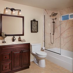 Re-Bath - Full Bathroom Remodel with Sofitel Gold Marble Walls and a Shower Panel instead of doors